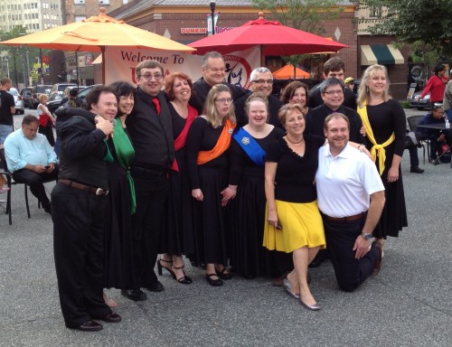 Chris Roth, Becky Stern and the Special Needs Ballroom Exhibition Team pose for a picture after performing at "Dancing in the Square" in 2013. 